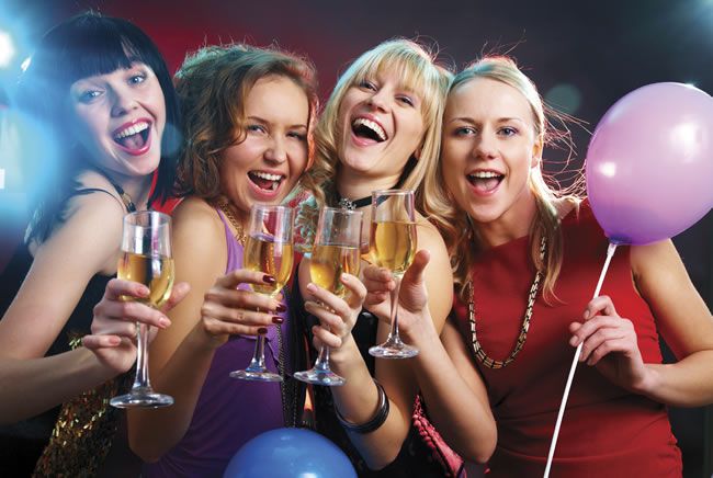 Group of smiling, drinking, partying women at a Bachelorette party. Coastal Party Supply has all you need to throw the ultimate Bachelorette party!