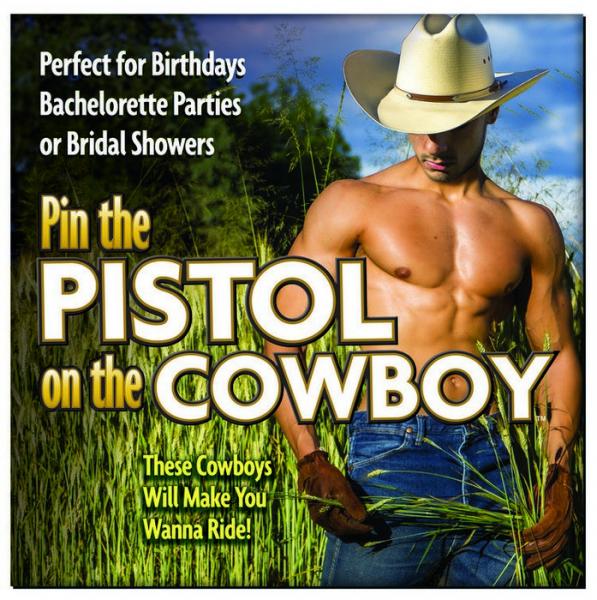 Sexy shirtless cowboy wearing blue jeans and a cowboy hat standing in a field on front of bachelorette party game Pin the Pistol on the Cowboy.